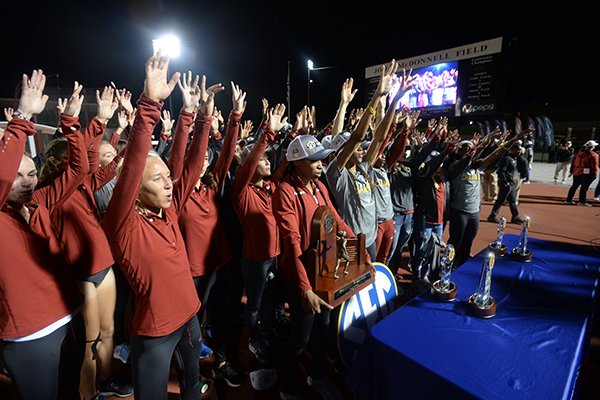 Arkansas' women's track and field team celebrates Saturday, May 11, 2019, after winning the SEC Outdoor Track and Field Championship at John McDonnell Field in Fayetteville.