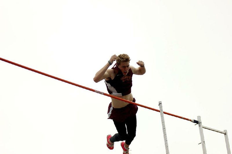 Lake Hamilton senior Haze Farmer clears the bar in the pole vault Saturday at 16 feet, 83/4 inches at the Meet of Champions at Lake Hamilton High School in Pearcy. Farmer won the event with a jump of 17-11/4 to set the Meet of Champions record.