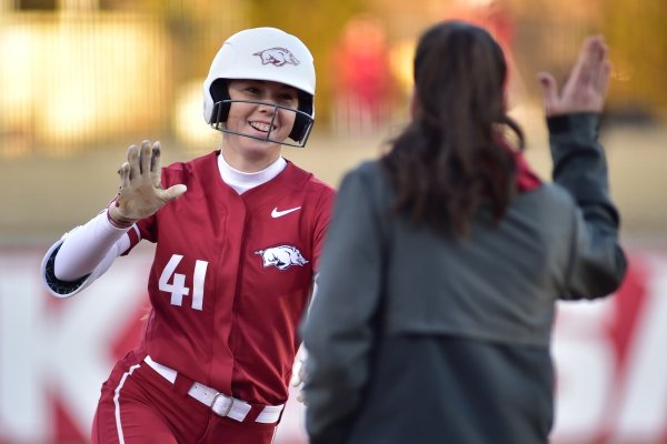 Arkansas sophomore Danielle Gibson rounds third base after hitting one of her four home runs against SIU-Edwardsville on Feb. 23. The Razorbacks won 15-3 in five innings.