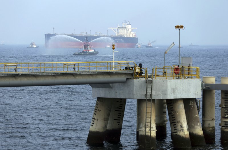 FILE - In this Sept. 21, 2016 file photo, an oil tanker approaches to the new Jetty during the launch of the new $650 million oil facility in Fujairah, United Arab Emirates. The United Arab Emirates said Sunday, May 12, 2019 that four commercial ships near Fujairah &quot;were subjected to sabotage operations&quot; after false reports circulated in Lebanese and Iranian media outlets saying there had been explosions at the Fujairah port. (AP Photo/Kamran Jebreili)