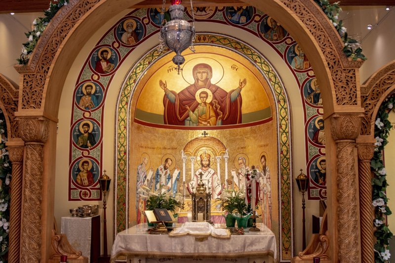 The completed mosaic behind the altar. The top of the alcove holds a painting of the Madonna and Child. Photo by Cary Jenkins of The Arkansas Democrat-Gazette