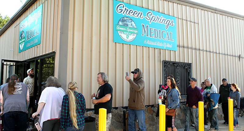 The Sentinel-Record/Richard Rasmussen OPEN FOR BUSINESS: About 70 people were in line outside Green Springs Medical on Seneca Street when it opened shortly after 8 a.m. on Monday, May 13, 2019. The medical marijuana dispensary was the first to open within the city limits of Hot Springs.