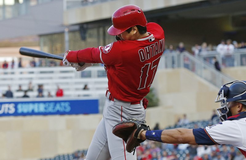 Los Angeles Angels Shohei Ohtani, of Japan, follows through on a two-run home run off Minnesota Twins pitcher Jose Berrios in the third inning of a baseball game Monday, May 13, 2019, in Minneapolis. (AP Photo/Jim Mone)