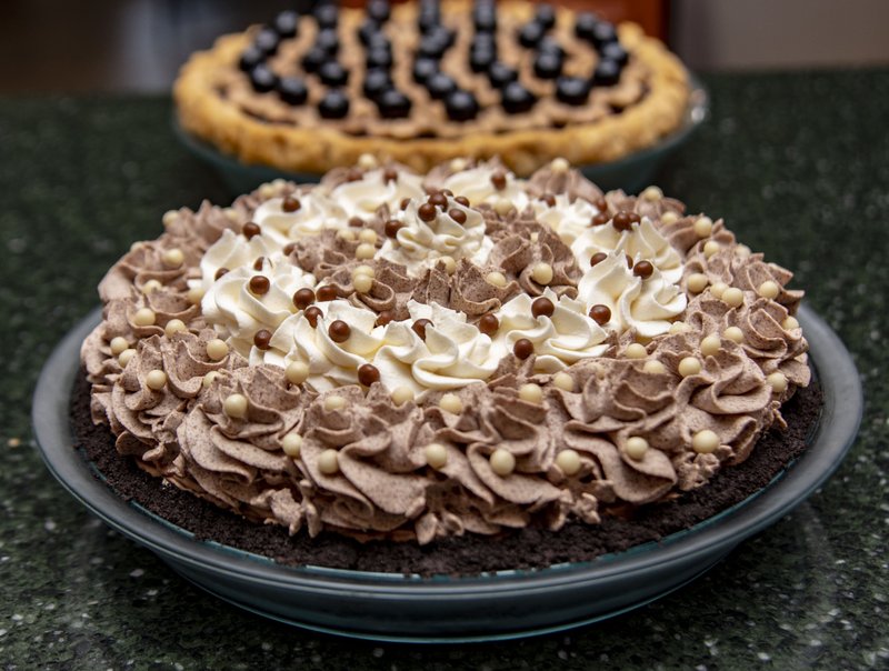 The decadent Denali Caribou Crunch Pie (foreground) was inspired by a vacation to Alaska. Photo by Cary Jenkins