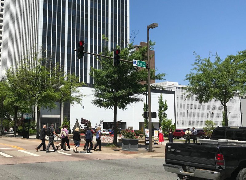 Artist Jason Jones was chosen to paint a 4,500-square-foot mural on the Union National Plaza building along West Capitol Avenue in Little Rock.