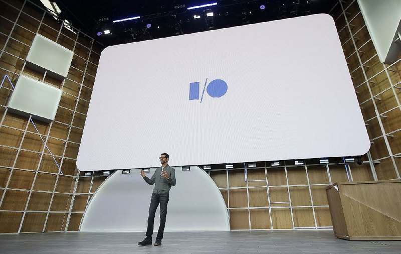 CEO Sundar Pichai speaks during the keynote address of the Google developer conference in Mountain View, Calif., last week. The company says it’s preparing to add new advertising formats to its online search, YouTube and other services. 
