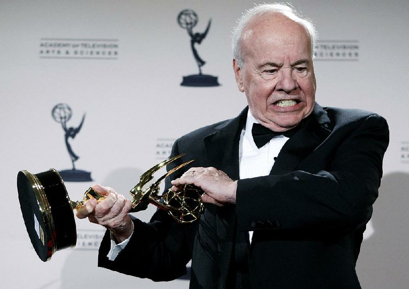 Actor and comedian Tim Conway poses with his award for Outstanding Guest Actor in a Comedy Series for his work on 30 Rock at the Creative Arts Emmy Awards in Los Angeles, in this 2008 file photo. Conway, the stellar second banana to Carol Burnett on The Carol Burnett Show, died Tuesday morning at the age of 85. 