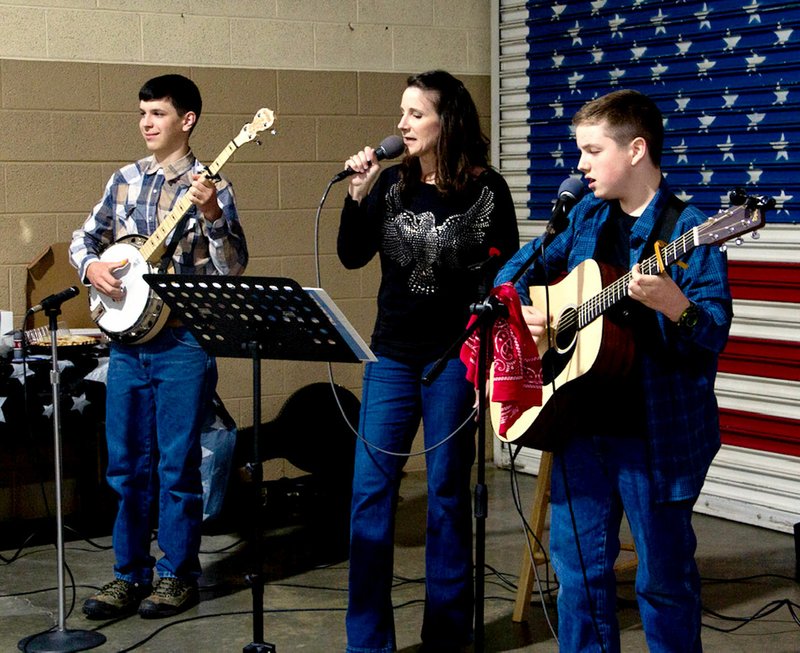 Photo submitted The O'Kelly Family of O'Kelly Automotive played patriotic bluegrass music for some of the entertainment of the evening.