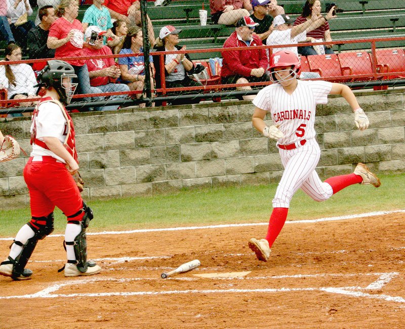 MARK HUMPHREY ENTERPRISE-LEADER Farmington senior Madison Parrish, shown during Regional play, went 1-for-4 with a 2-run homer in the Lady Cardinals' 11-5 State 4A softball tournament quarterfinal victory over De Queen Friday.