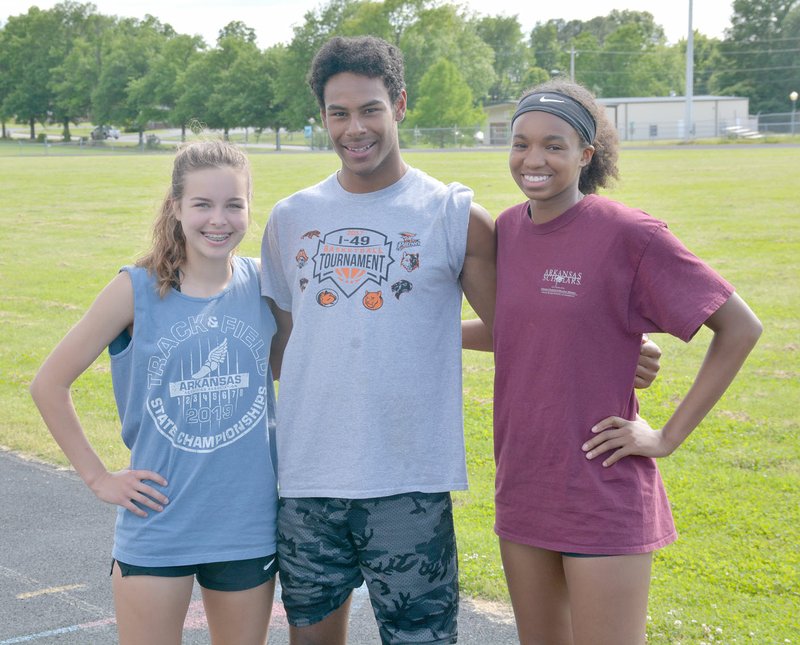 Graham Thomas/Herald-Leader Siloam Springs sophomore Quincy Efurd, left, sophomore Keegan Soucie and junior Jael Harried are scheduled to participate Wednesday and Thursday in the Arkansas State Decathlon/Heptathlon in Fayetteville. Efurd and Harried will compete in the Heptathlon while Soucie will be in the Decathlon.