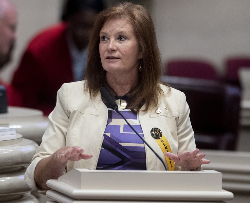 In this Tuesday, April 30, 2019 file photo, Rep. Terri Collins answers questions during debate on the abortion ban bill at the Alabama Statehouse in Montgomery, Ala.  (Mickey Welsh/The Montgomery Advertiser via AP, File)