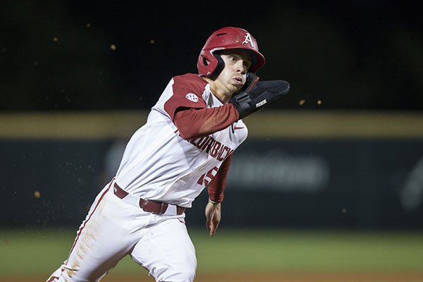 Arkansas shortstop Casey Martin rounds third base during a game against LSU on Thursday, May 9, 2019, in Fayetteville. 