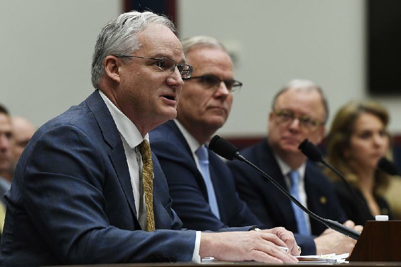 Earl Lawrence (left), executive director of the Federal Aviation Administration’s certification service, testifies Wednesday during a hearing on the status of the Boeing 737 Max aircraft. Beside him are Daniel Elwell (middle), acting FAA administrator; and Robert L. Sumwalt, chairman of the National Transportation Safety Board. 