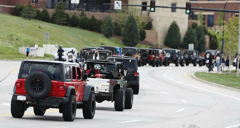 More than 600 Jeeps caravan Wednesday to the memorial service for Kendrick Castillo, the student killed in last week’s shooting at the STEM Highlands Ranch School in Highlands Ranch, Colo. 