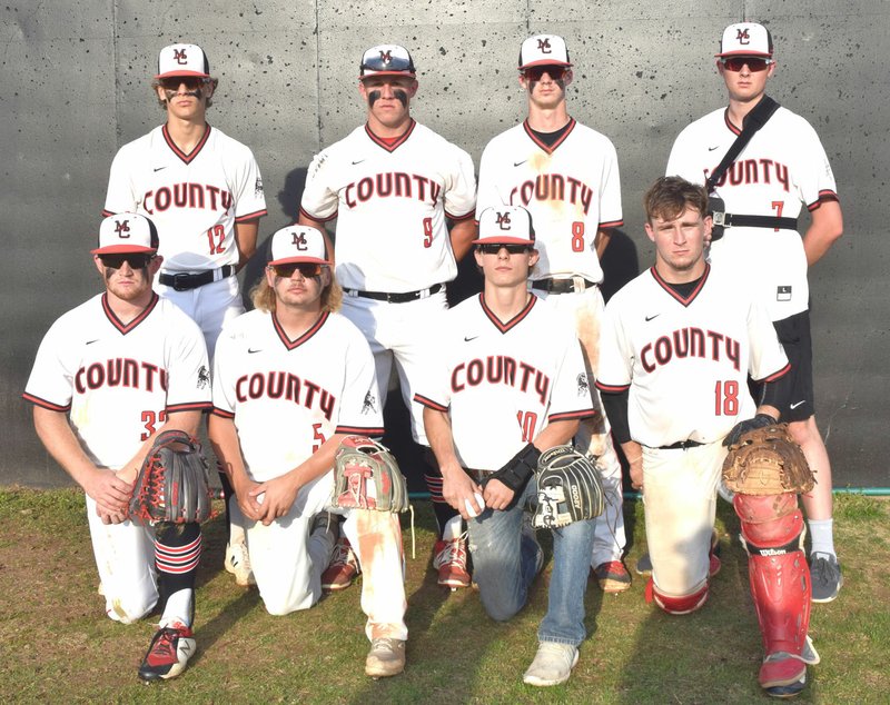 RICK PECK/SPECIAL TO MCDONALD COUNTY PRESS The McDonald County High School baseball team honored its eight seniors on May 6 following the Mustangs' 9-0 loss to Logan-Rogersville at MCHS. Seniors shown are Oakley Roessler (front, left), Izak Johnson, Jordan Platter and Joe Brown; Boston Dowd (back, left), Micah Burkholder, Blaine Lemm and Charlie Moore.