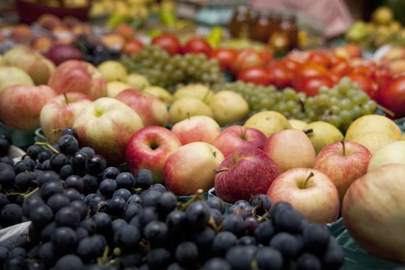 FILE - In this Sept. 18, 2014 file photo, produce is displayed for sale at a farmers market in Kalamazoo, Mich. (Katie Alaimo/Kalamazoo Gazette via AP)