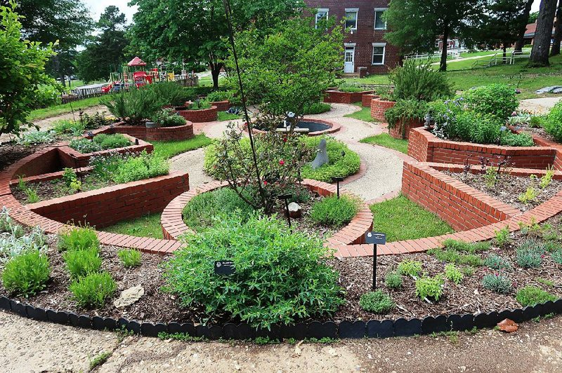 The Arkansas Herb Unit created and maintains this Garden of Exploration at the Arkansas School for the Blind and Visually Impaired in Little Rock.