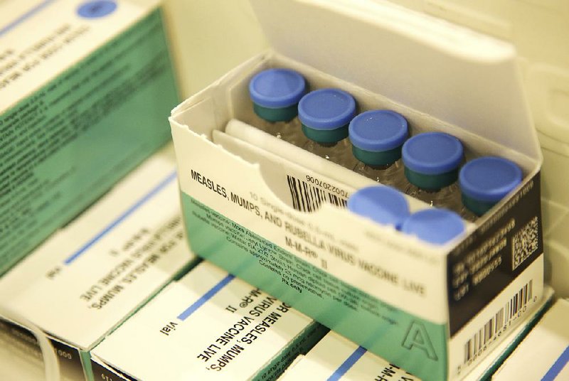 In this March 27 file photo, measles, mumps and rubella vaccines are seen in a cooler at the Rockland County Health Department in Pomona, N.Y. 