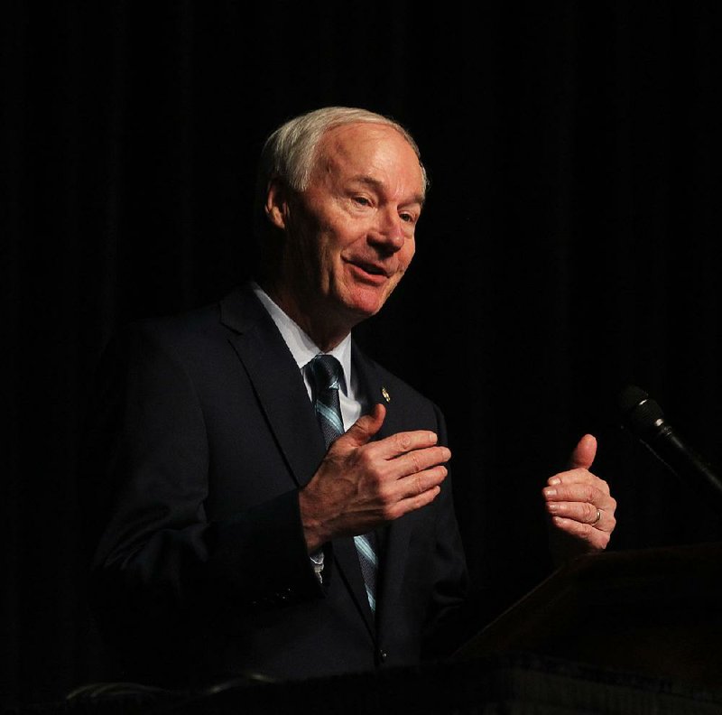 Gov. Asa Hutchinson talks Thursday in Hot Springs about plans for funding state highway improvements. He spoke at the Arkansas Rural Economic Development Conference and said he’d like the Highway Commission to develop a plan for how it would use money raised for roadways. 