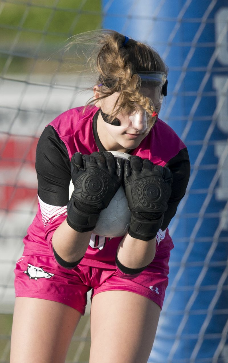 NWA Democrat-Gazette/CHARLIE KAIJO Fayetteville High School goalkeeper Haley Woodward (0) blocks a shot at the goal during a soccer game, Friday, April 20, 2018 at Rogers High School in Rogers.