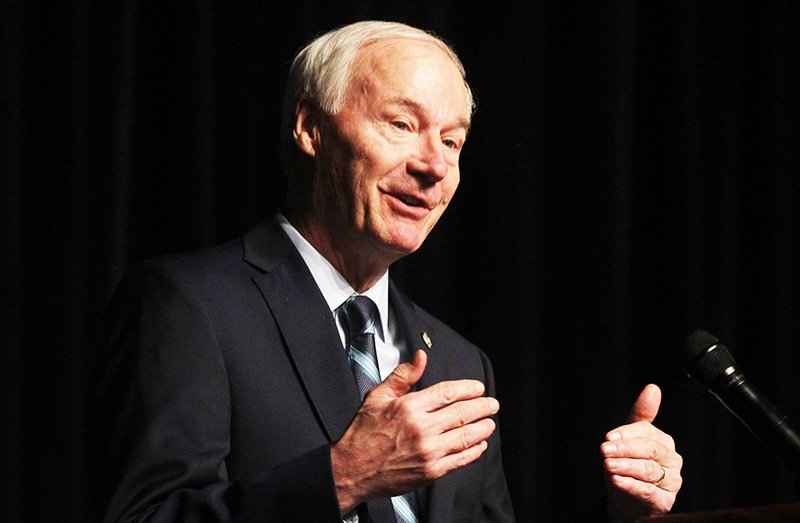 The Sentinel-Record/Richard Rasmussen GOVERNOR SPEAKS: Gov. Asa Hutchinson speaks at the Arkansas Rural Economic Development Conference Thursday at the Hot Springs Convention Center. Hutchinson shared his goals for bringing high-speed broadband internet to rural communities across the state by 2022.
