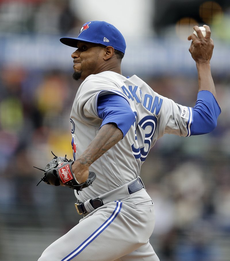 The Associated Press TEAM 14: Toronto Blue Jays pitcher Edwin Jackson works against the San Francisco Giants in the first inning of Wednesday's game in San Francisco. Jackson became the first player in major league history to play for 14 teams with Wednesday's start.