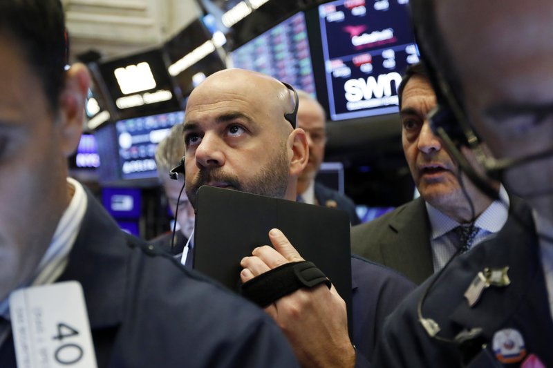 In this May 9, 2019, file photo trader Fred DeMarco works on the floor of the New York Stock Exchange.  (AP Photo/Richard Drew, File)