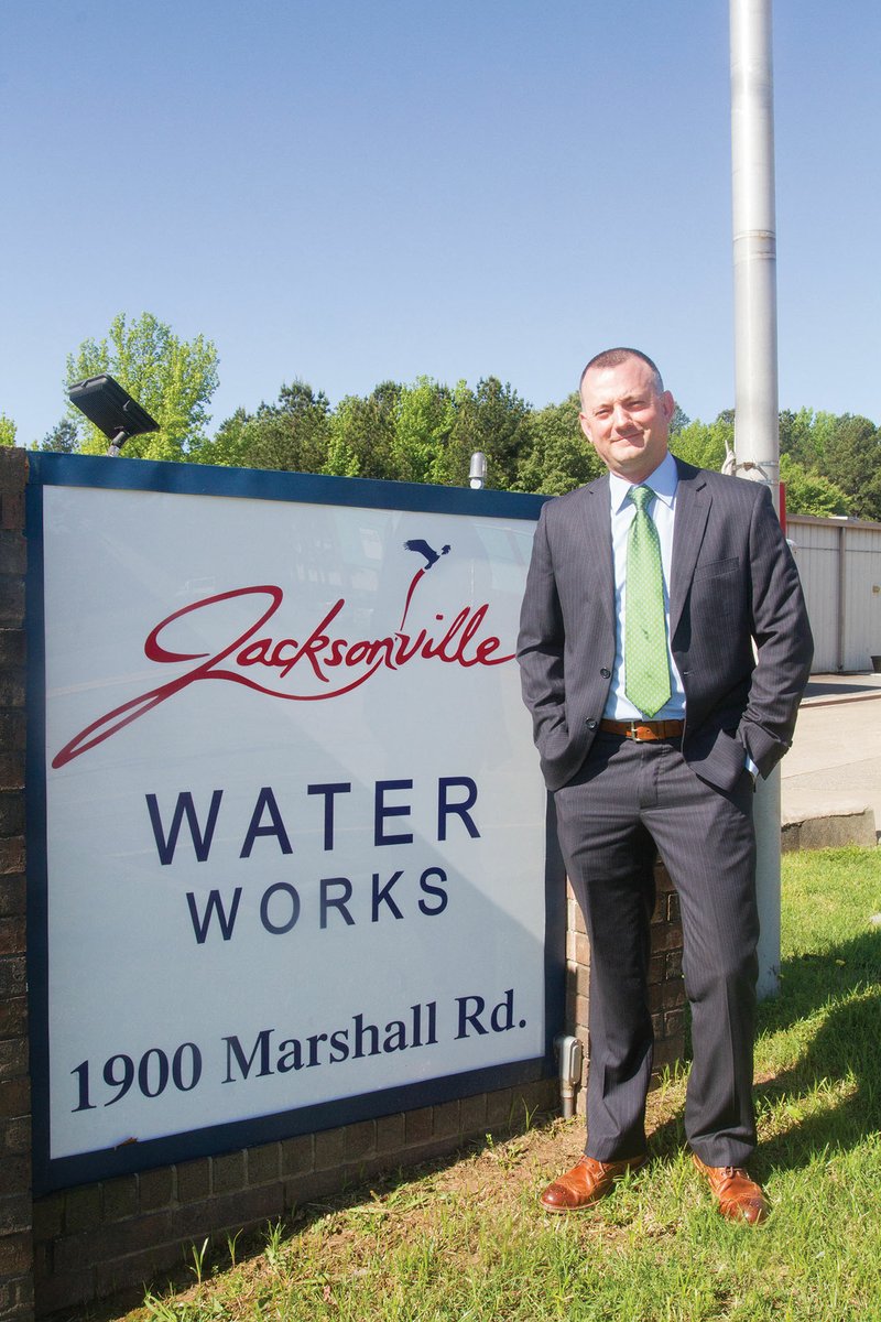 Jake Short stands next to the sign outside the Jacksonville Water Works, where he has been general manager since 2012. Short, who started at the water department as a temporary employee in 2007, said his department’s 50-year contract to take over the water service for the Little Rock Air Force Base may have had a small role in the area recently receiving the Abilene Trophy for the third time. The award is given to the community that best supports its local Air Force base.
