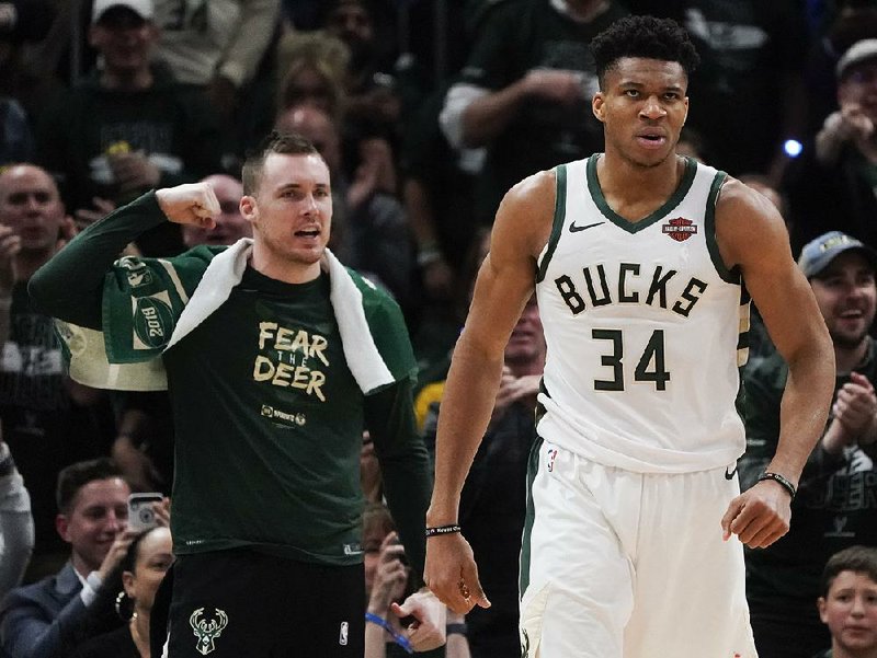 Giannis Antetokounmpo scored a team-high 30 points on 10- of-20 shooting from the floor to lead the Milwaukee Bucks to a 125-103 victory over the Toronto Raptors on Friday in Milwaukee.