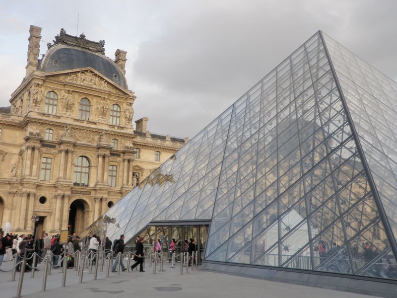 Millions of people each year enter the Louvre through its glass pyramid. Democrat-Gazette file photo
