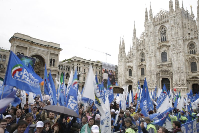 People attend a rally organized by League leader Matteo Salvini, with leaders of other European nationalist parties, ahead of the May 23-26 European Parliamentary elections, in Milan, Italy, Saturday, May 18, 2019. (AP Photo/Luca Bruno)