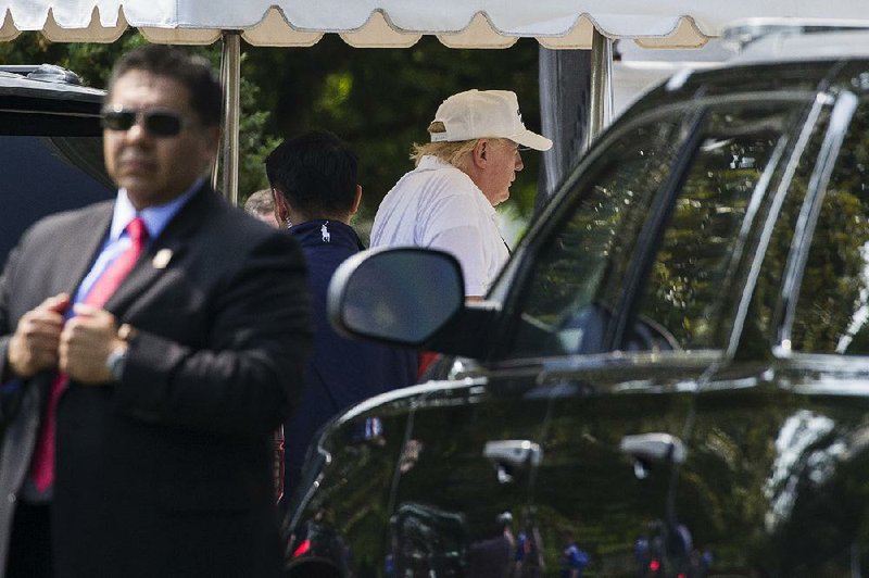 President Donald Trump, shown arriving back at the White House on Sunday from Trump National Golf Club in Virginia, lashed out on Twitter against Rep. Justin Amash’s criticism, calling him “a total lightweight.” 