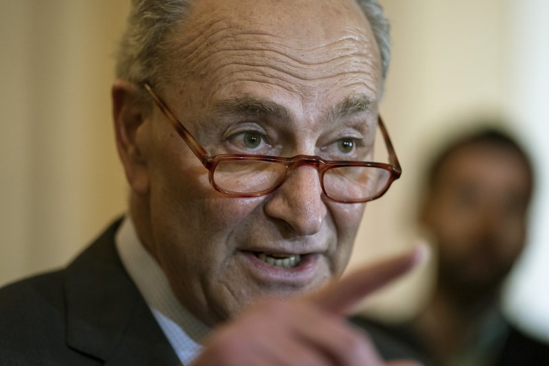 FILE - In this May 14, 2019 photo, Senate Minority Leader Chuck Schumer, D-N.Y., speaks to reporters at the Capitol in Washington. The Senate's top Democrat wants an investigation into whether a plan for new subway cars in New York City designed by a Chinese state-owned company could pose a threat to national security. Schumer said in a statement to The Associated Press on Sunday, May 19 he's asked the Commerce Department to conduct a &quot;top-to-bottom review&quot; after CRRC won a design contest for new subway cars in New York City. The company hasn't won a contract in New York, although it has been awarded contracts for new rail cars in Los Angeles, Chicago, Boston and Philadelphia. (AP Photo/J. Scott Applewhite, File)