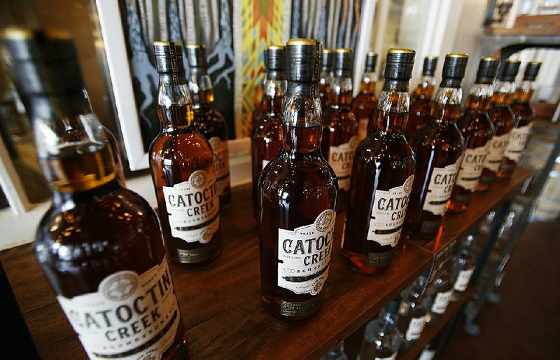 Catoctin Creek Distillery bourbon is displayed last summer in a tasting room in Purcellville, Va. 