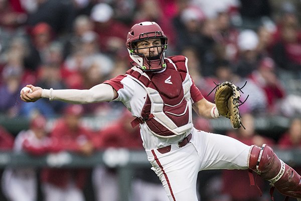 Arkansas catcher Casey Opitz throws toward first base during a game against LSU on Thursday, May 9, 2019, at Baum-Walker Stadium in Fayetteville. 