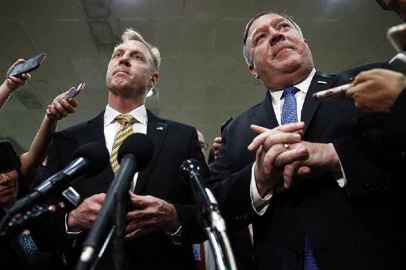 Acting Defense Secretary Patrick Shanahan (left), with Secretary of State Mike Pompeo, said Tuesday that “repositioning of assets” had deterred attacks. 