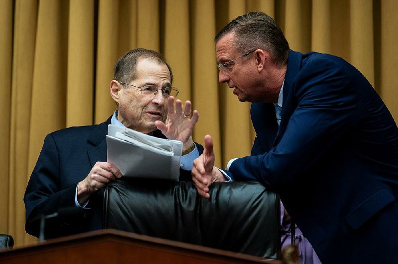 House Judiciary Committee Chairman Jerrold Nadler (left) and ranking GOP member Doug Collins confer during Tuesday’s hearing, which adjourned after 23 minutes with no witness to question. 