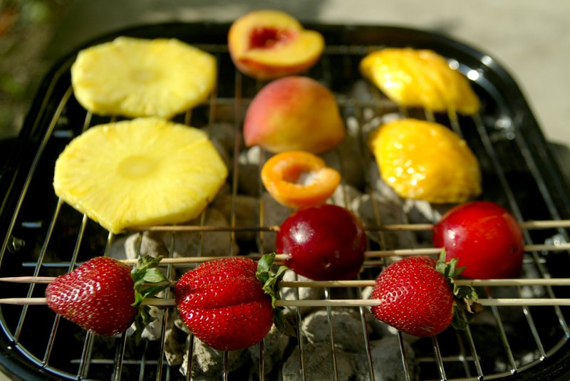 Steaks may taste fine with a little extra char, but grilled fruit needs a sparkling clean grill grate to taste its best.
Democrat-Gazette file photo
