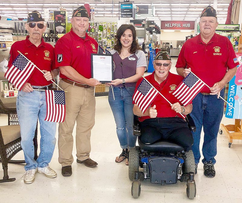 Photograph courtesy of Chris Snow Members of the Pea Ridge Veterans of Foreign Wars joined F.L. Davis Ace Hardware manager Caitlin Baker. VFW members are, from left Bob Hauter, commander Chris Snow, vice commander Howard Schuettpelz and Jerry Burton.