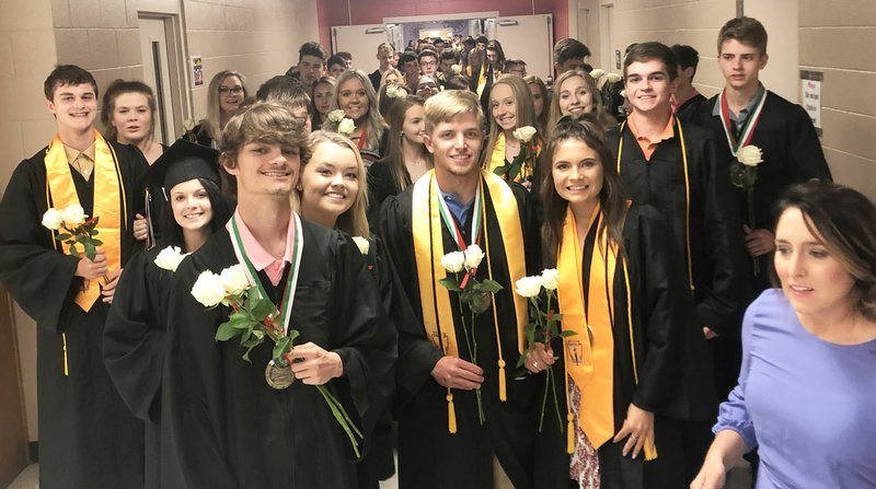 TIMES photograph by Annette Beard Pea Ridge High School graduating seniors lined up in the hallway outside the gym Friday night prior to entering the gym for baccalaureate.