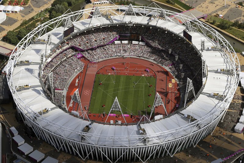  In this Aug. 3, 2012, file photo, Olympic Stadium is viewed during the Summer Olympics at Olympic Park in London. The traditional rivalry New York Yankees and the Boston Red Sox will take a radical twist when they meet in London next month: They will play on artificial turf for the first time in more than 2,200 games over a century. Major League Baseball has access to Olympic Stadium for 21 days before the games on June 29 and 30, the sport's first regular-season contests in Europe, and just five days after to clear out. (AP Photo/Jeff J Mitchell, Pool, File)