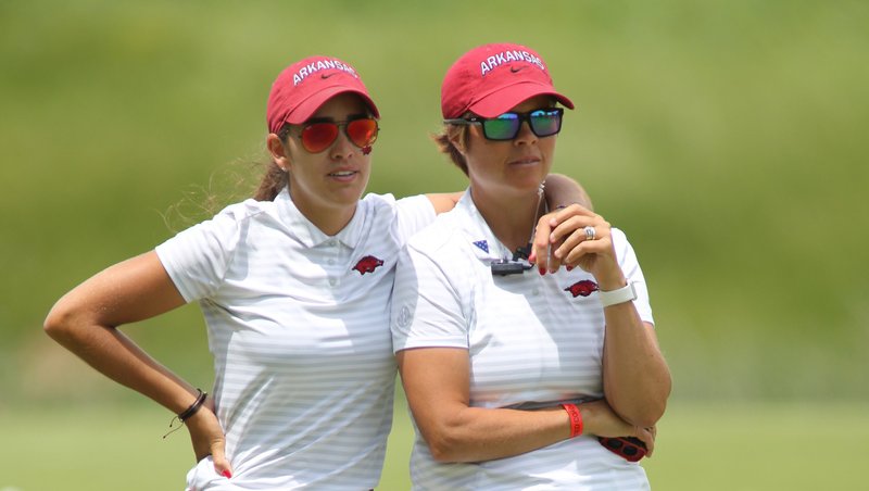 University of Arkansas' Maria Fassi (left) is shown Monday, May 20, 2019, with head coach Shauna Taylor on the first fairway during the NCAA women's golf championship Monday the Blessings Golf Club in Johnson.