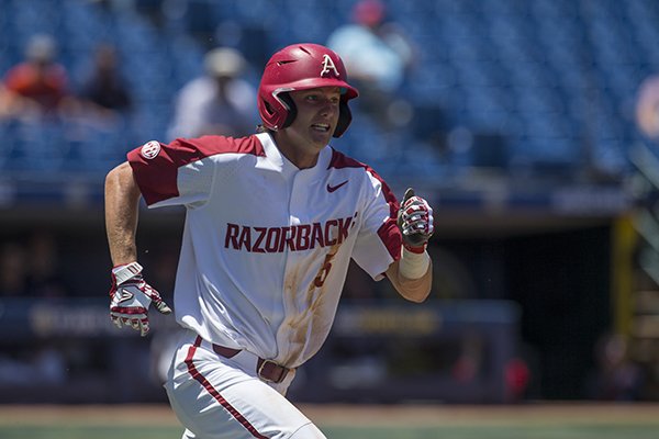 Arkansas third baseman Jacob Nesbit runs the bases after recording a base hit during a Southeastern Conference Tournament game against Ole Miss on Wednesday, May 22, 2019, in Hoover, Ala. 