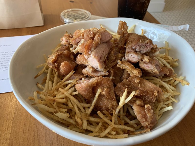 Asian-style fried chicken — boneless breast or leg meat in a bowl with "hay" fries — is at the heart of the menu at Haybird. Arkansas Democrat-Gazette/Eric E. Harrison
