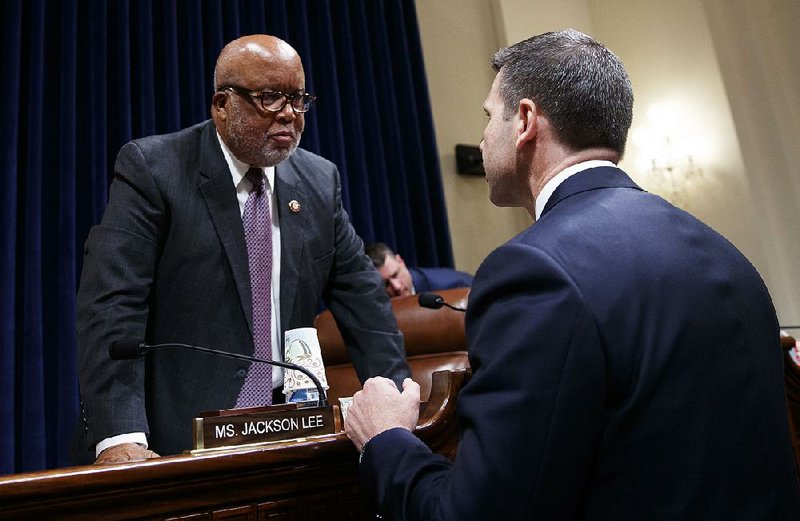House Homeland Security Committee chairman Bennie Thompson (left), D-Miss., speaks with Kevin McAleenan, acting Homeland Security secretary, after a hearing Wednesday on Capital Hill. 