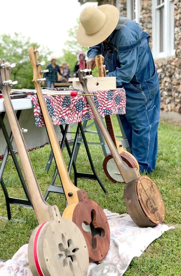 Courtesy photo Doug Crane of Joplin displays his talent in creating banjos at the recent New Bethel Heritage Festival. Crane has built more than 100 banjos.