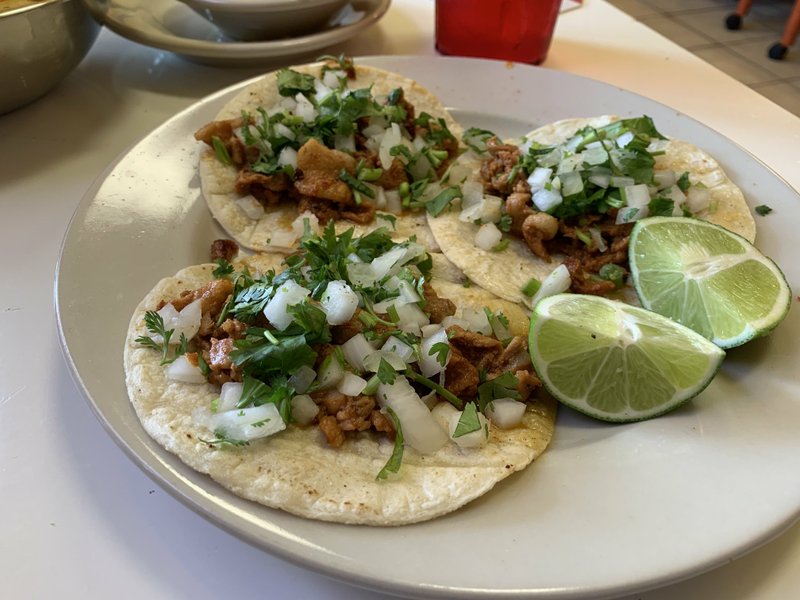 Three Tacos al Pastor are a reasonable $5 at Three Amigo's Restaurante on Cantrell Road in Little Rock. Arkansas Democrat-Gazette/Eric E. Harrison
