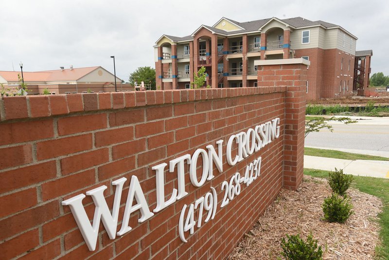 NWA Democrat-Gazette/FLIP PUTTHOFF New apartments are under construction Wednesday in Bentonville. 