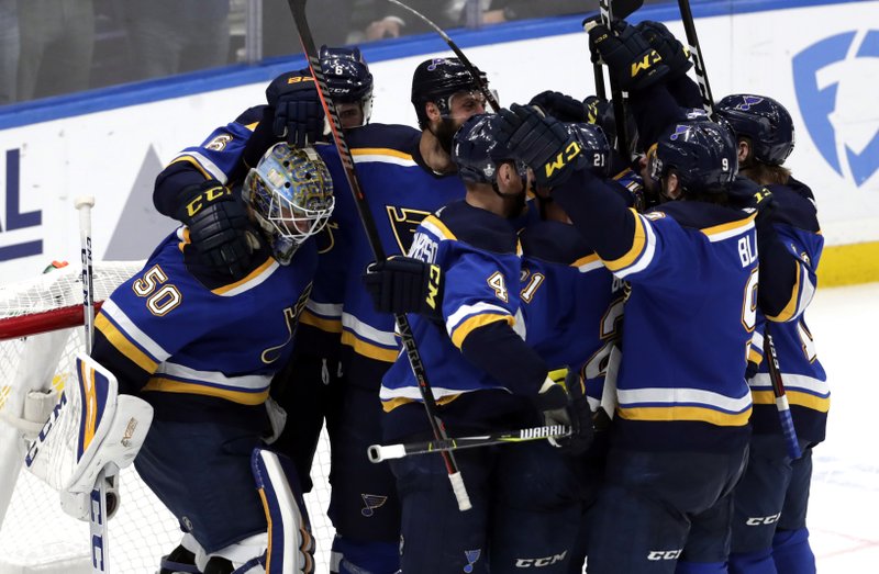 The Associated Press MOVING ON: Members of the St. Louis Blues celebrate after defeating the San Jose Sharks, 5-1, in Tuesday's NHL Stanley Cup Western Conference final in St. Louis.