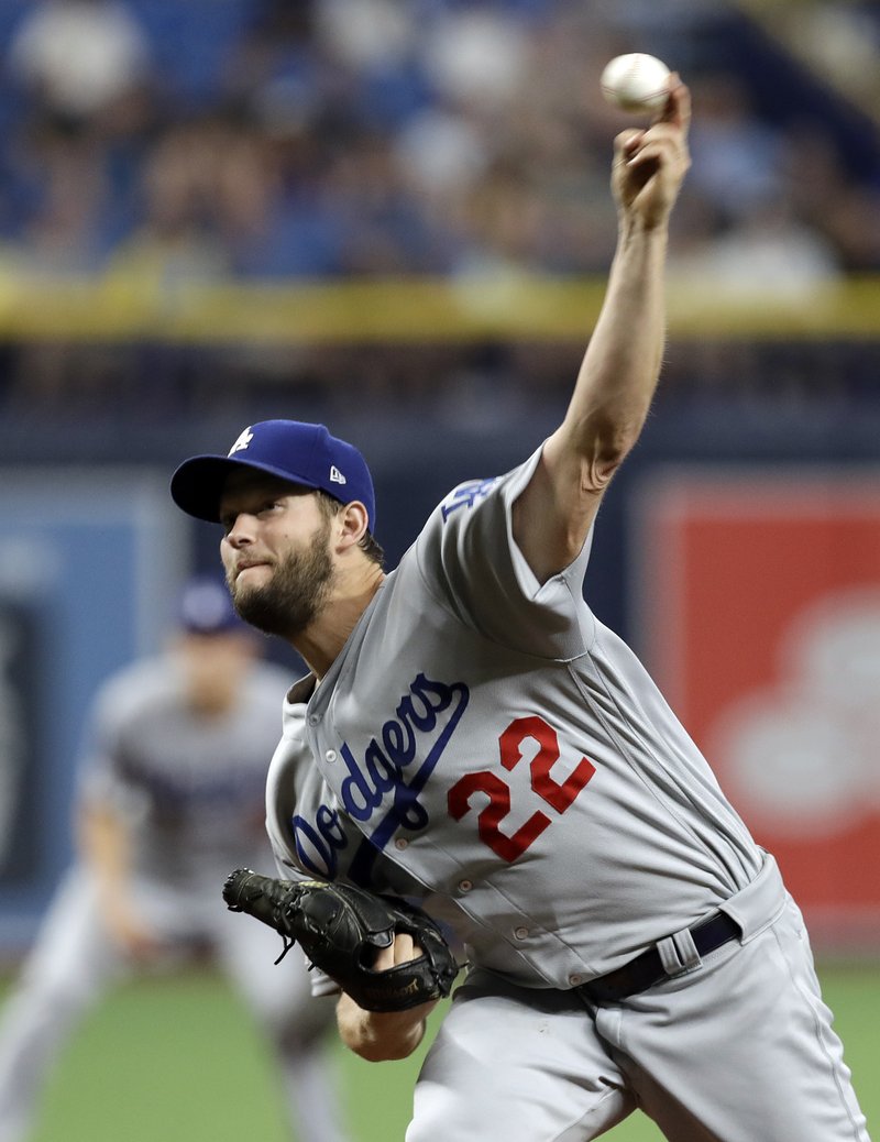 The Associated Press STRIKEOUT KING: Los Angeles Dodgers' Clayton Kershaw pitches to the Tampa Bay Rays during the first inning of Tuesday's game in St. Petersburg, Fla.